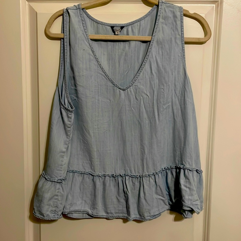 Woman’s top, peplum, cotton material but looks like denim. Size XL